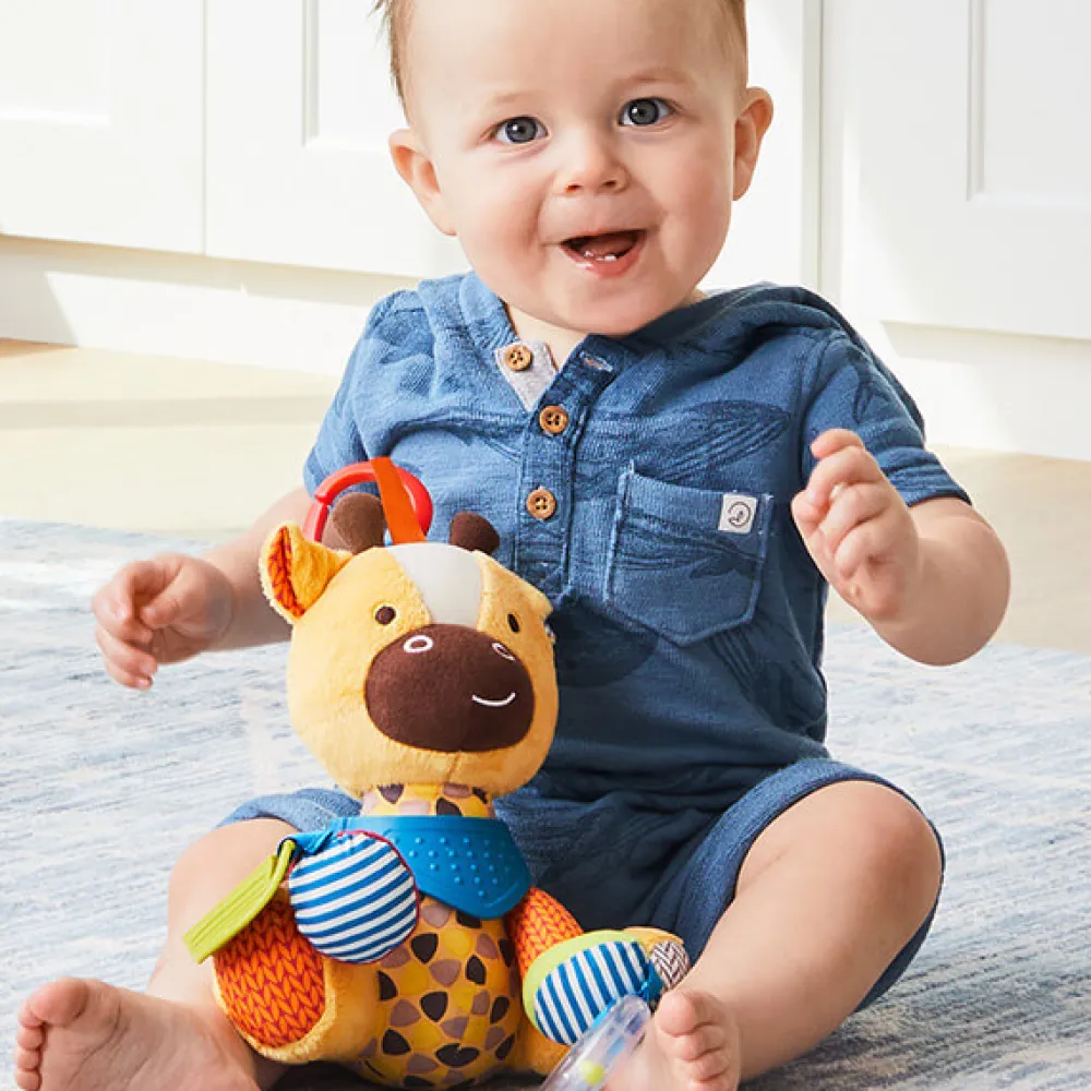 SKIP HOP Muñeco de actividades jirafa