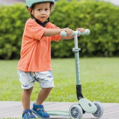 GLOBBER Patinete ecológico, plegable y con luces Junior – Pistacho